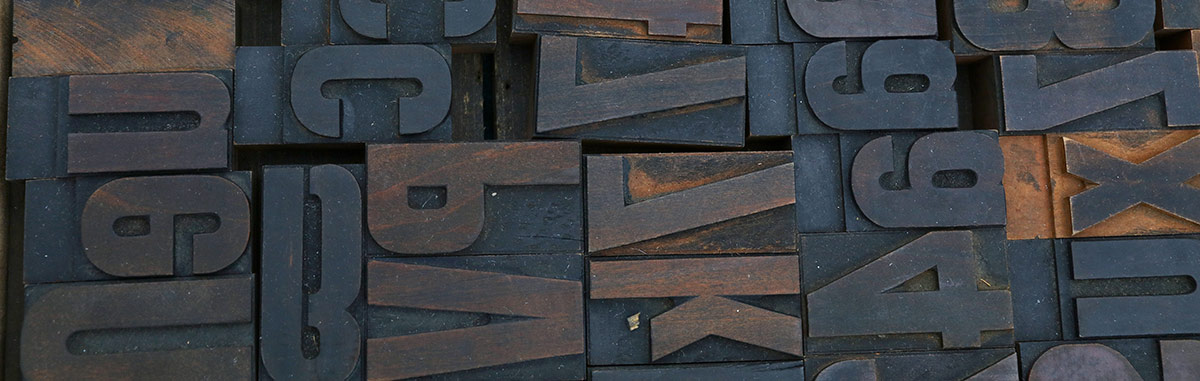 Old wooden vintage typography printing blocks